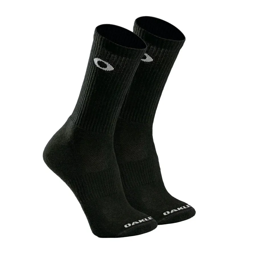 Par de meias masculinas Oakley cano alto na cor preta, com logo branco, em fundo branco